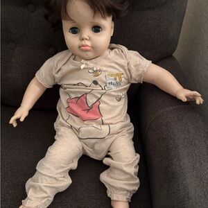 Pouty Patty. Realistic doll baby wearing Winnie the Pooh Baby Outfit